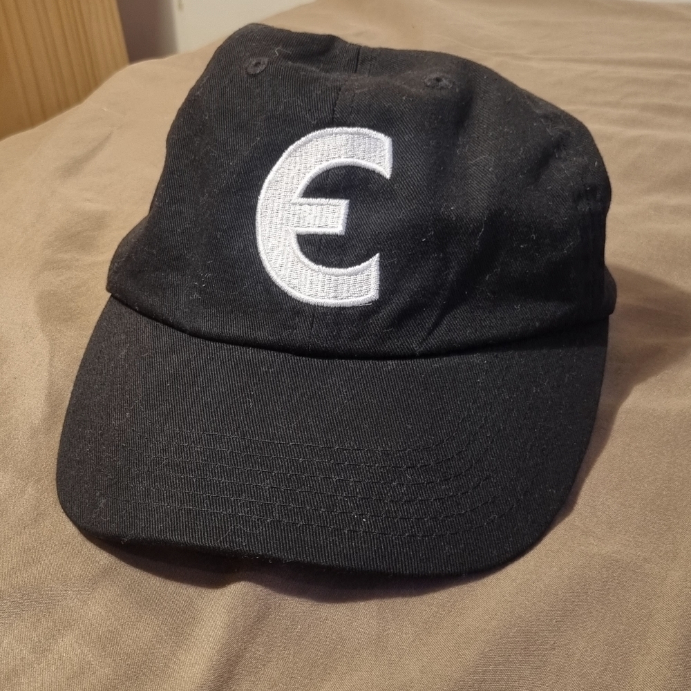 The Elwins Black Cap with White Logo